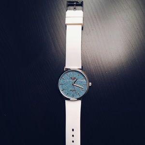 Silver Roxy watch with rose gold accents